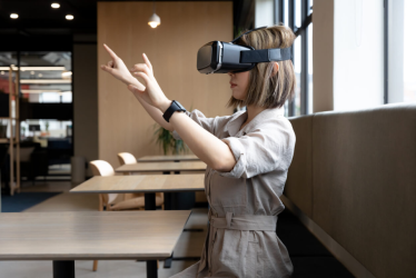A lady using VR set in a showroom.