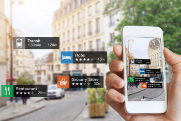 A man using AR service on smartphone.